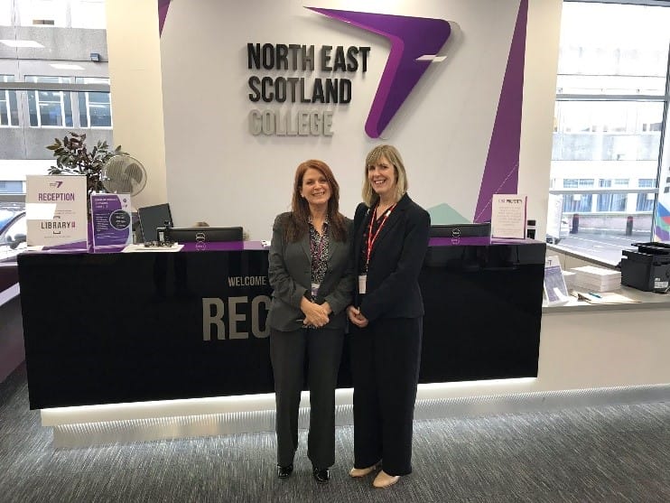 SCQFP Development Officer, Fiona Garry, at NorthEast Scotland College reception area with member of college staff