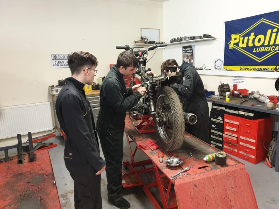 RUTS Bikefix students fixing a bike