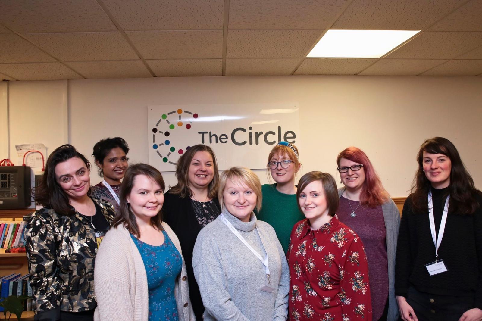 Group of The Circle Academy participants posing for a photo